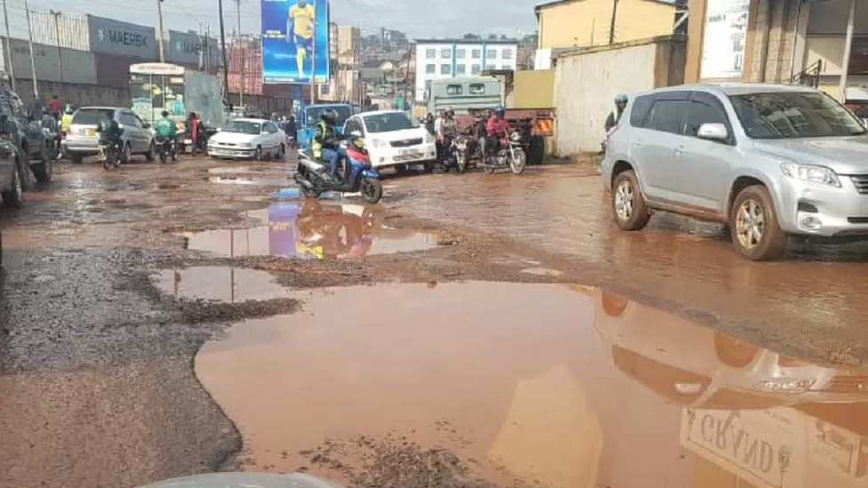 Ugandans rage over roads: ‘Not a pothole but a pond’ The potholes form an obstacle course for drivers on some roads