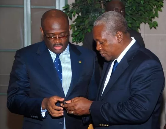 Stan Dogbe writes: I am sceptical about govt’s announced withdrawal of VAT on electricity Stan Dogbe (L) interacts with former President John Mahama