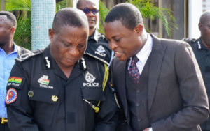 Inspector-General of Police, Mr. Christian Tetteh Yohuno, (left), in a tete-a-tete with Special Prosecutor, Mr. Kissi Agyebeng